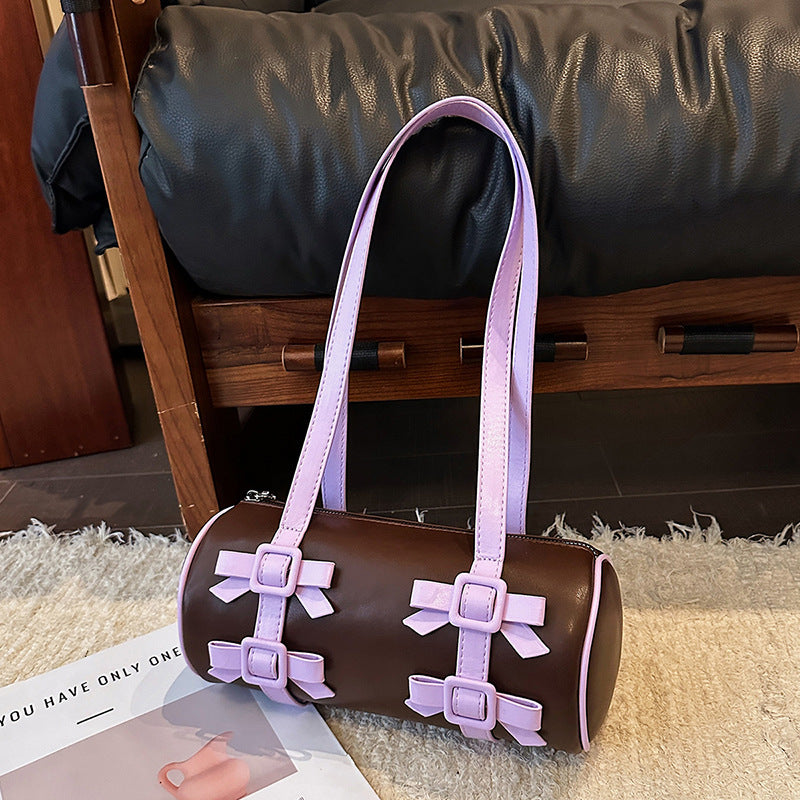 Bow-Accent Barrel Bag