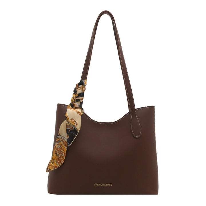 Elegant Structured Tote Handbag with Decorative Scarf