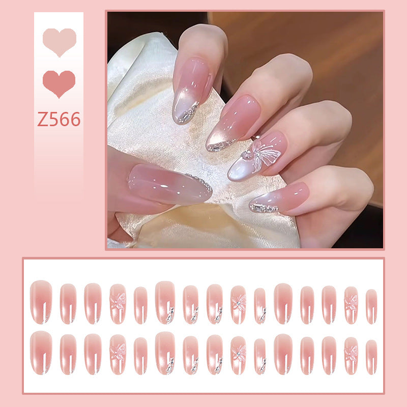 Acrylic nail set with elegant ombre design and sparkling accents Stornfield