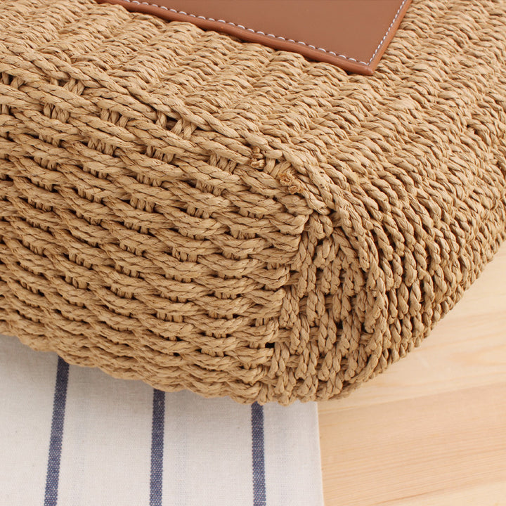 Natural raffia tote bag with elegant leather accents Stornfield