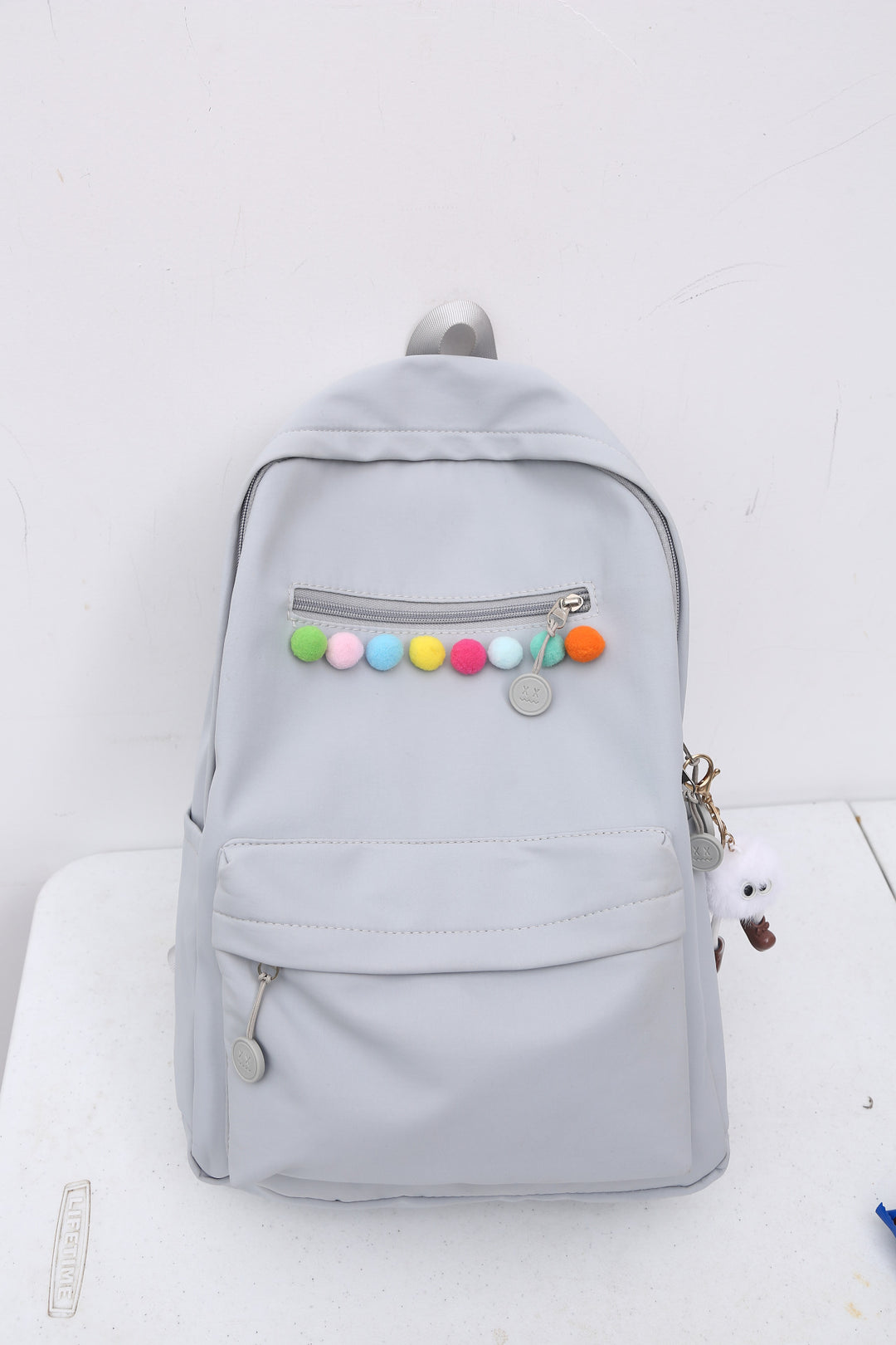 Practical backpack with colorful applications Stornfield