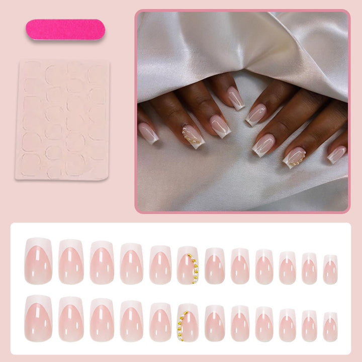 Artificial nail set with elegant French tips and glitter accents Stornfield
