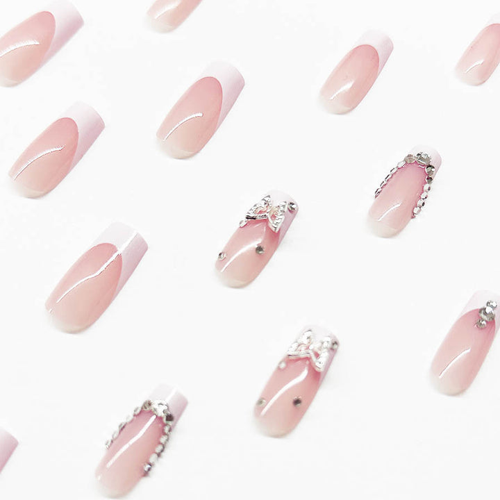 Acrylic nail set with elegant rhinestone and glitter decorations Stornfield