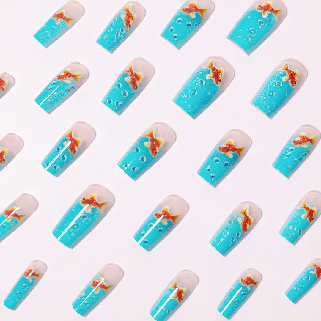 Artificial nail design with golden fish Stornfield
