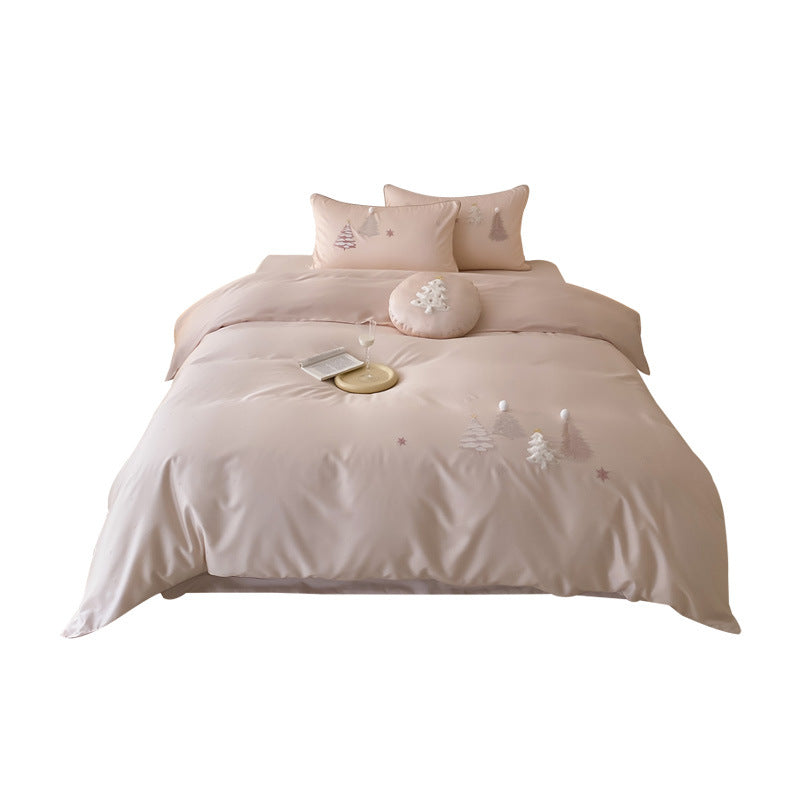 Luxurious satin bedding set with winter pine embroidery and pompom applications