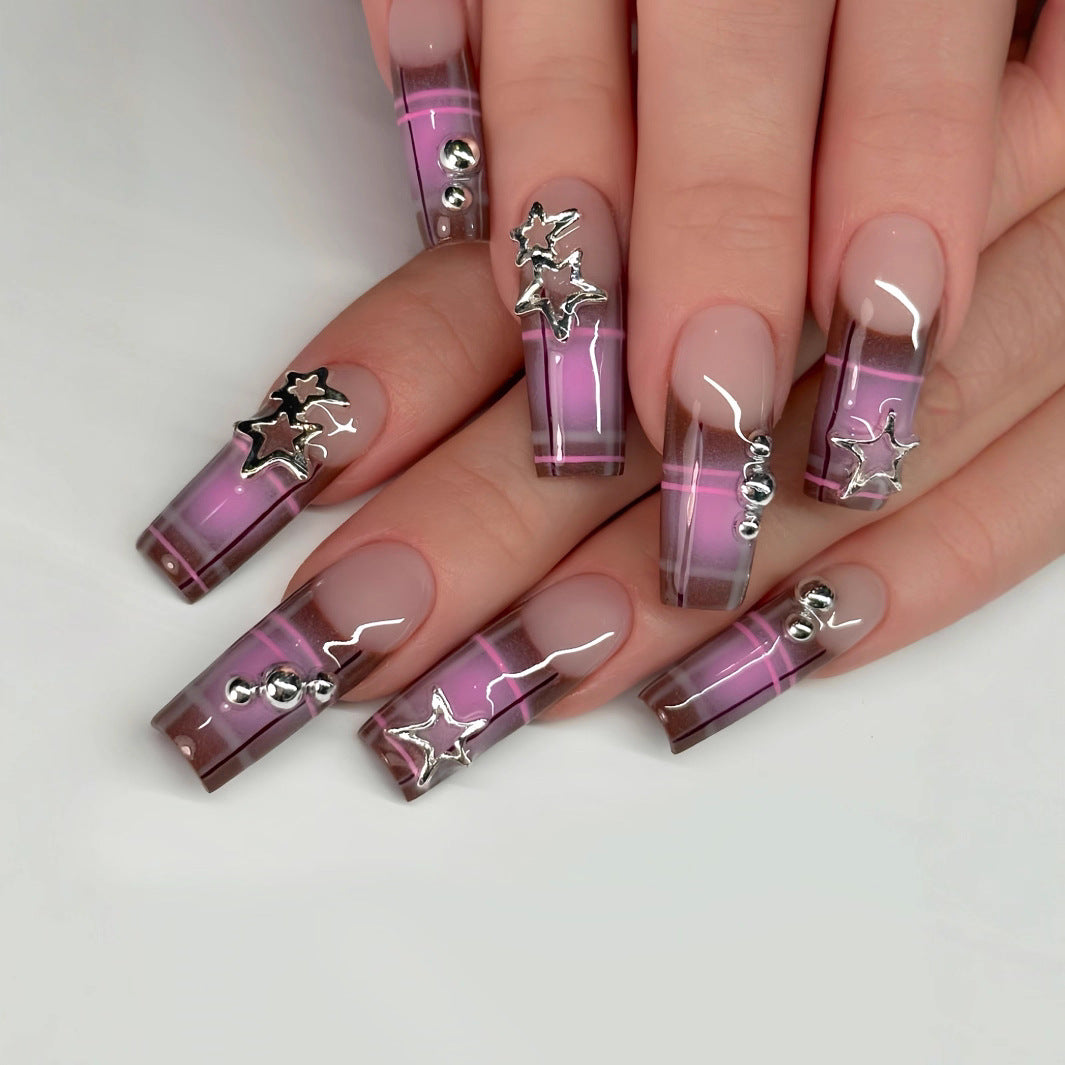 Artistic Star-Embellished Nail Art Stornfield