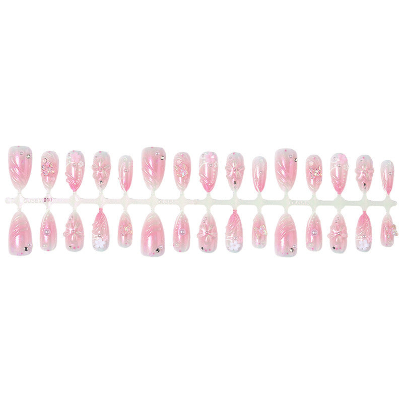 Acrylic nail set with elegant flower design and glitter accents Stornfield