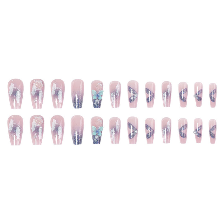 Artistic 3D nail extensions with glitter accents Stornfield