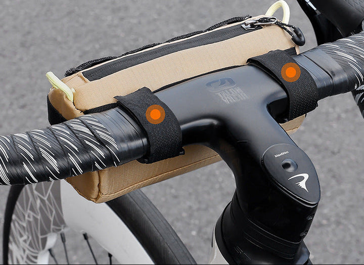 compact cylindrical handlebar bag with elastic bungee and universal Velcro mount Stornfield