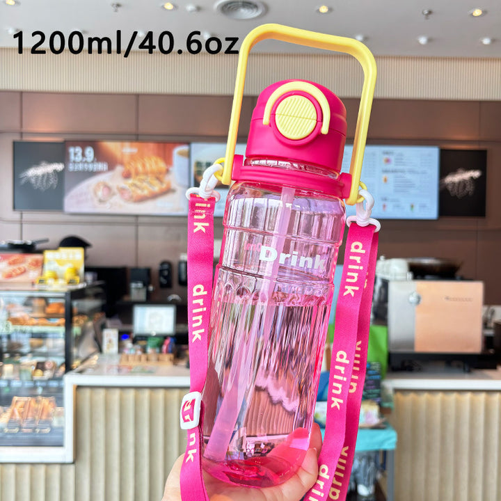 Women's large transparent drinking bottle with integrated carrying handle Stornfield