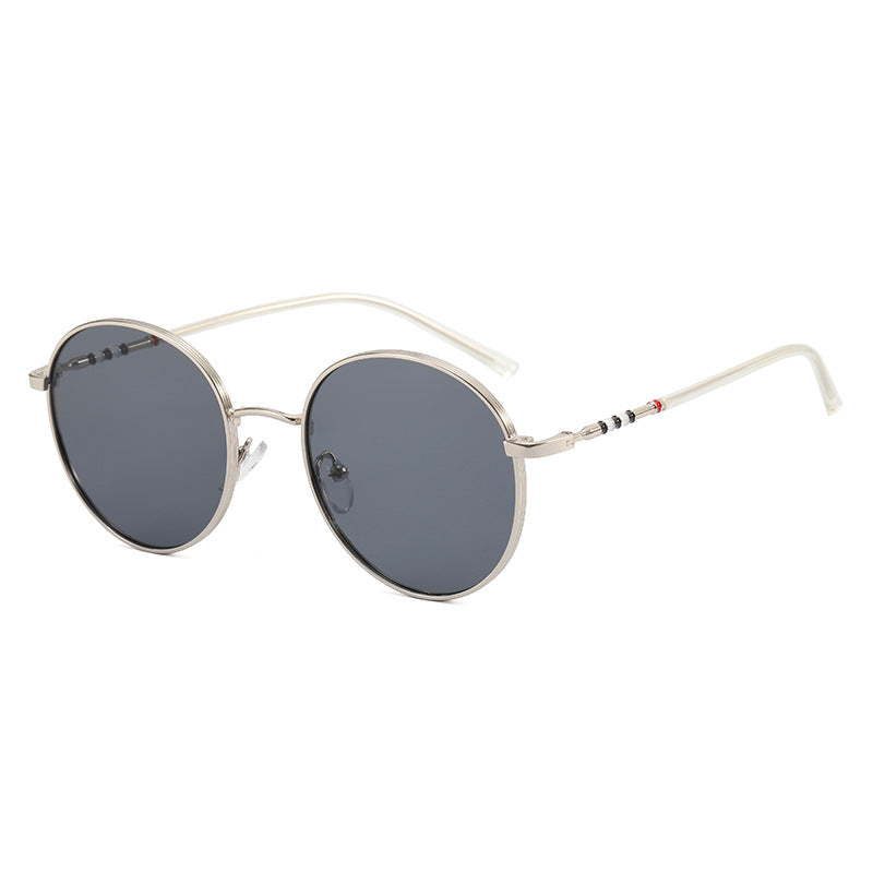 Ladies fashionable round sunglasses with elegant metal frame Stornfield