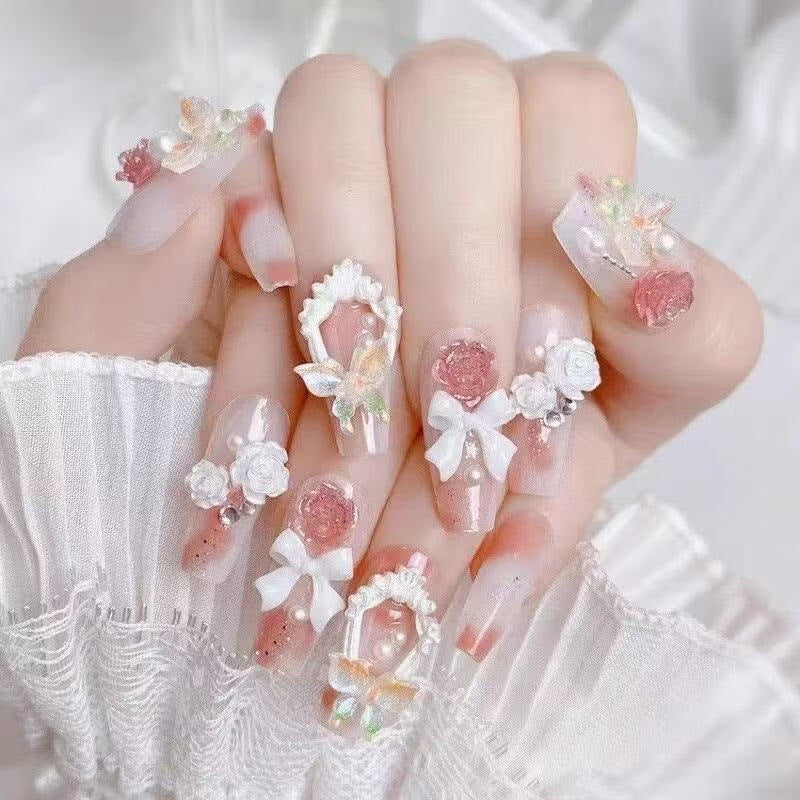 Artistic nail set with 3D flower and bow details Stornfield