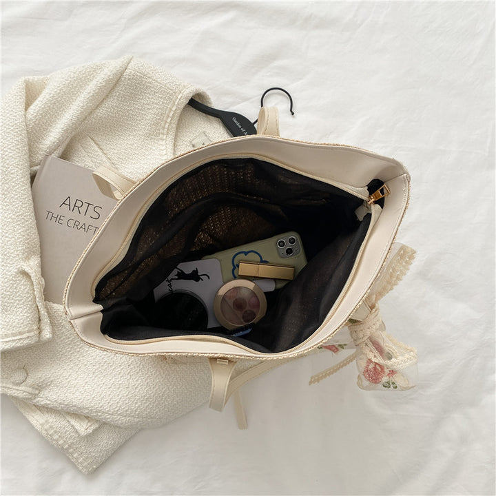 Elegant Woven Straw Tote Bag with Decorative Bow