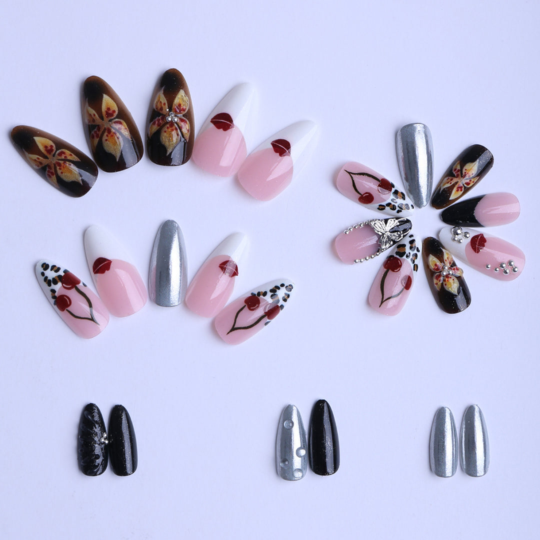 Artful Stiletto Fingernails with Unique Design Elements Stornfield