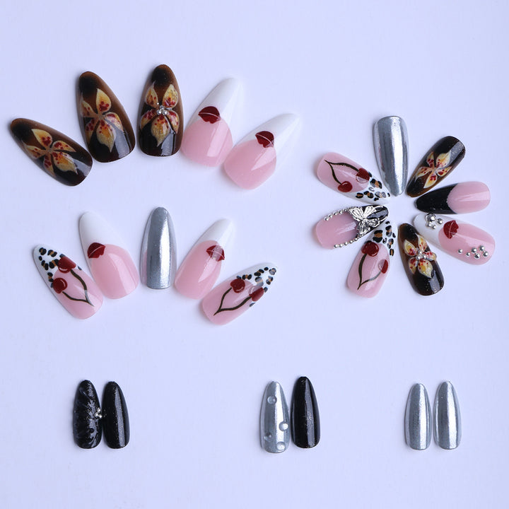 Artful Stiletto Fingernails with Unique Design Elements Stornfield