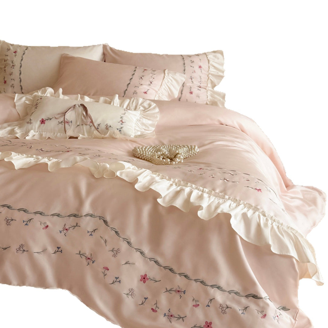 Romantic bedding set with ruffles and floral embroidered cotton satin