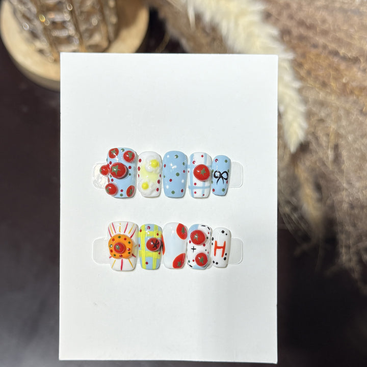 Artistic Press-On Nail Set with Playful Floral and Polka Dot Designs Stornfield