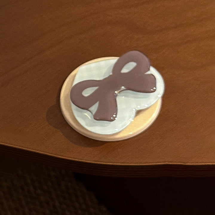 Decorative ceramic coaster with bow motif Stornfield