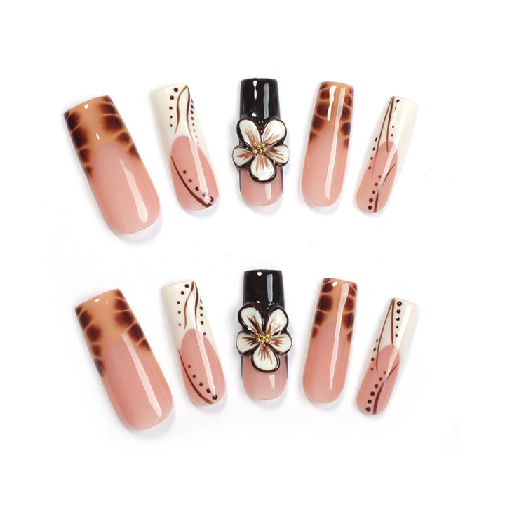 Creative nail art set with delicate floral and glitter accents Stornfield
