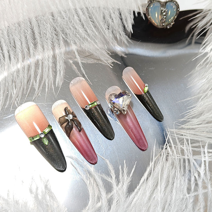 Artificial nails with elegant tip design and glitter accents Stornfield