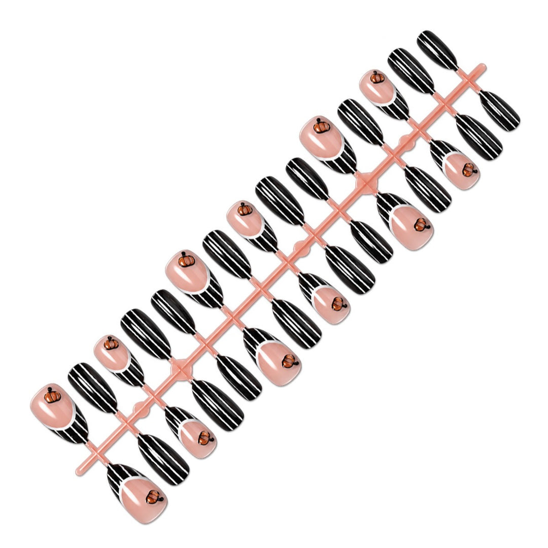 Nail art set with elegant zebra designs and creative accents Stornfield