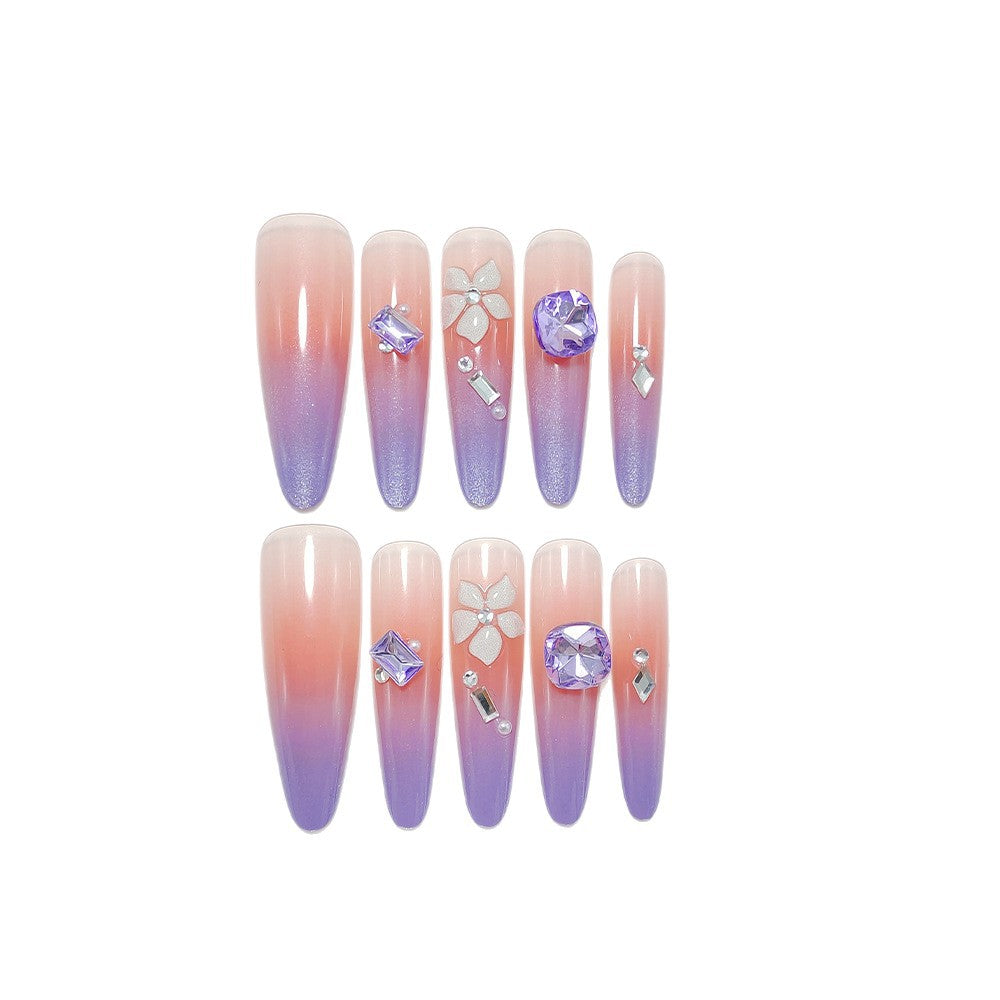 Artistic fingernails with delicate rhinestone details Stornfield