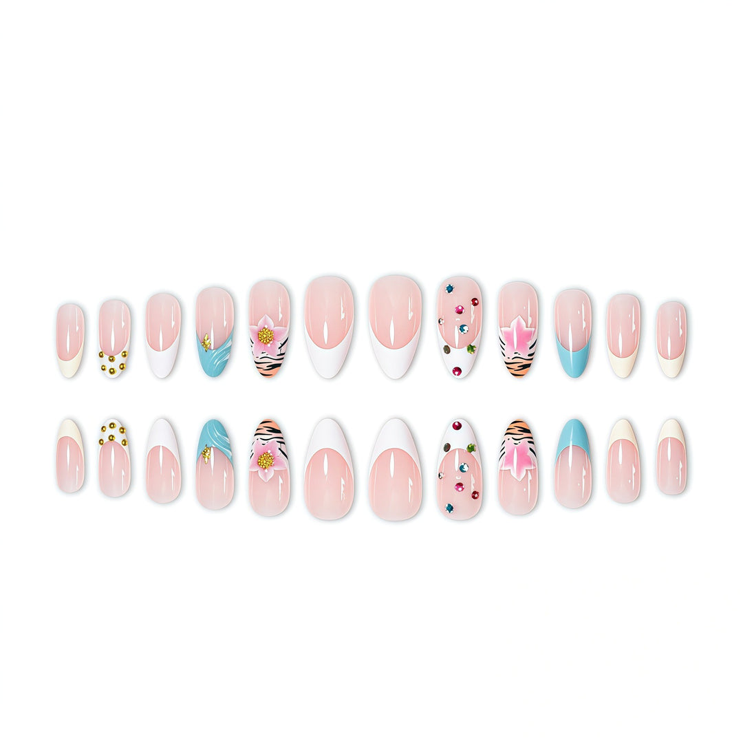 Artistic Stiletto Nail Enhancements with Unique Emblem Accents Stornfield
