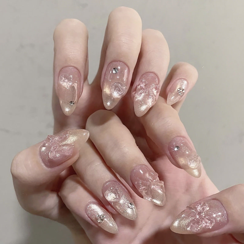 Artful stiletto nails with floral design and glitter accents Stornfield