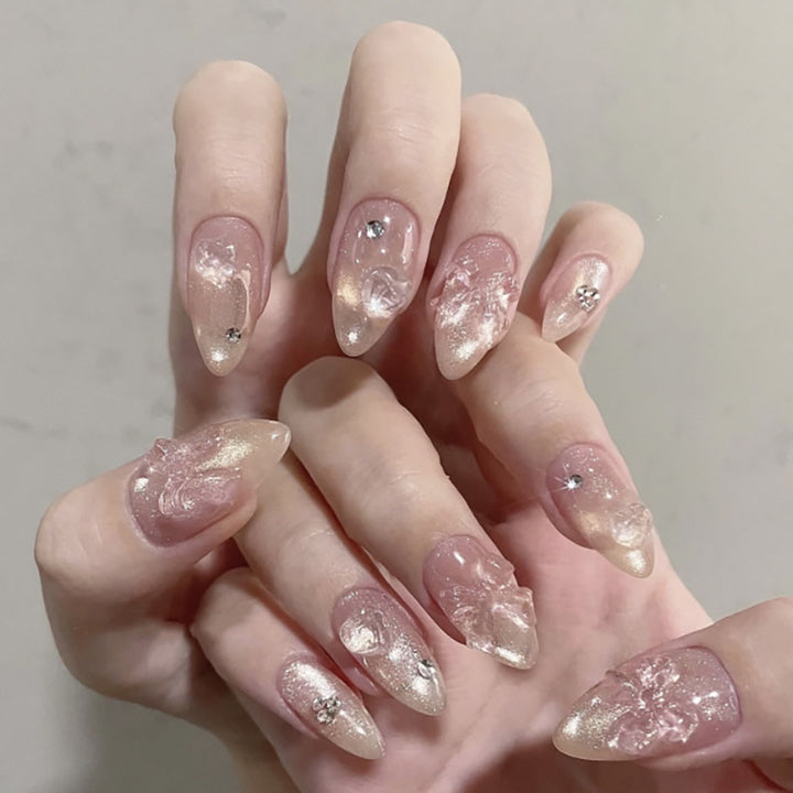 Artful stiletto nails with floral design and glitter accents Stornfield