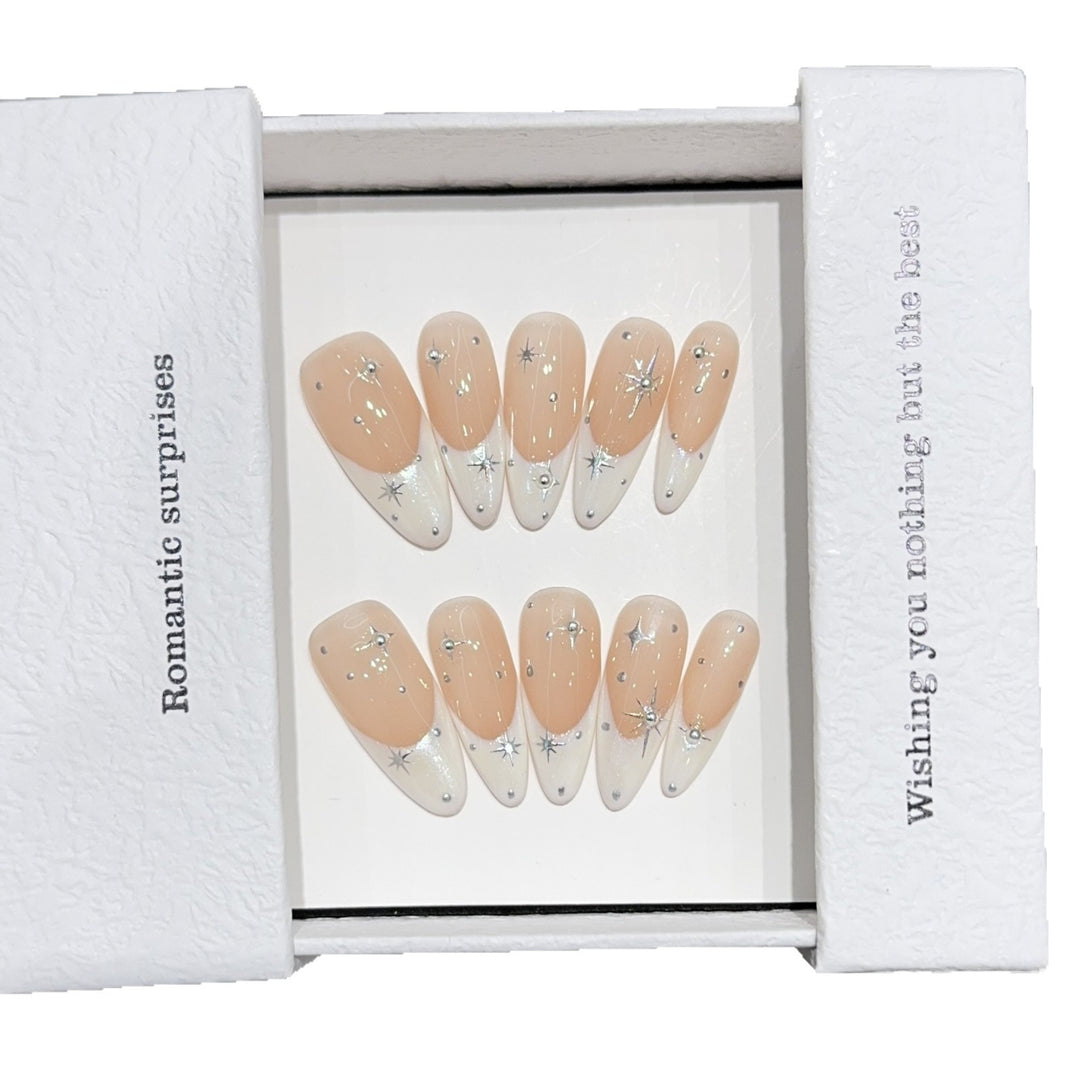 Glamorous artificial nails with romantic star pattern Stornfield