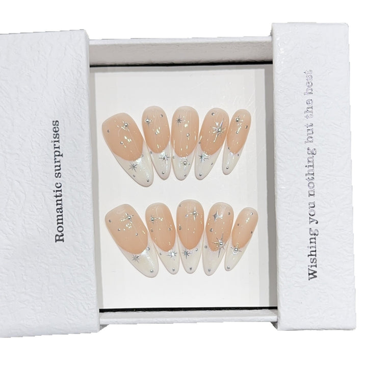 Glamorous artificial nails with romantic star pattern Stornfield