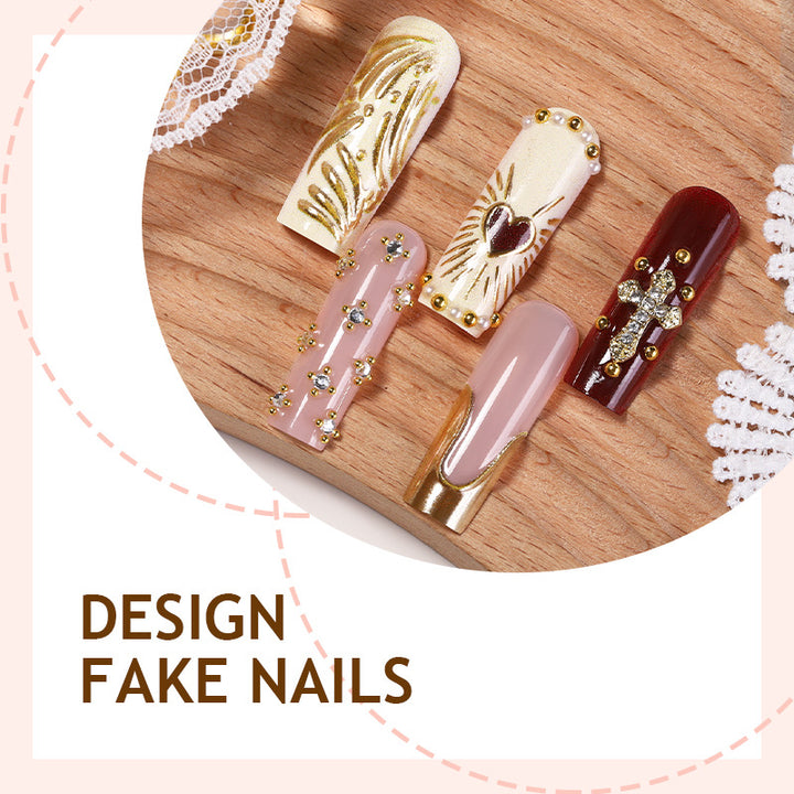 Acrylic nail set with luxurious golden accents and sparkling embellishments Stornfield