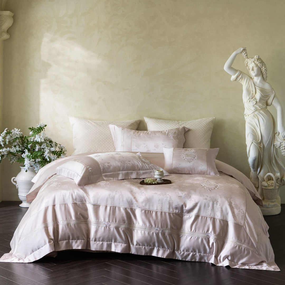 Luxurious satin bedding set with embroidered medallions and elegant quilting