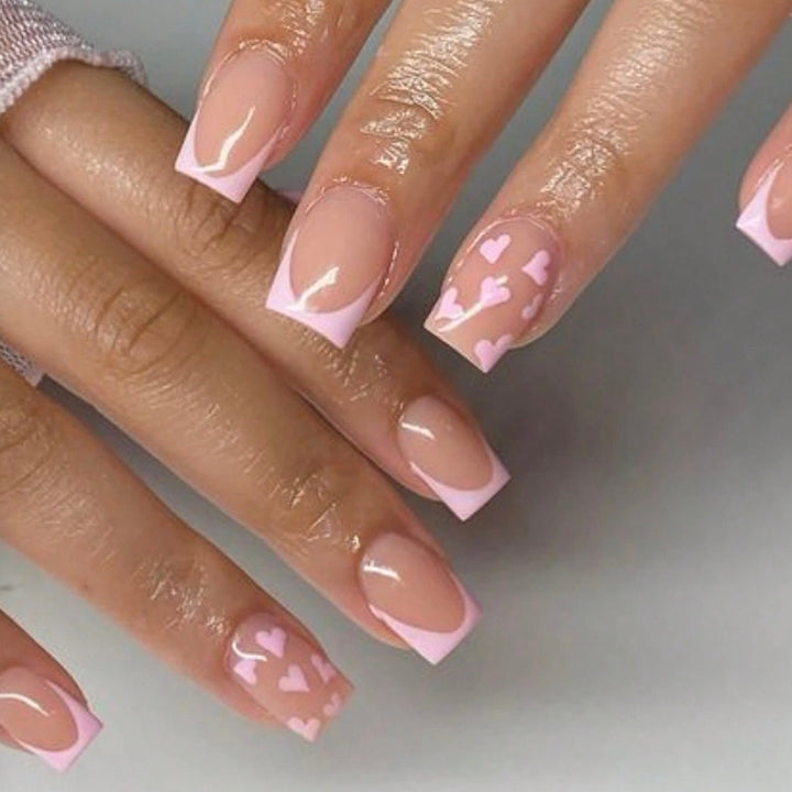Art nail set with romantic heart designs and elegant French design Stornfield