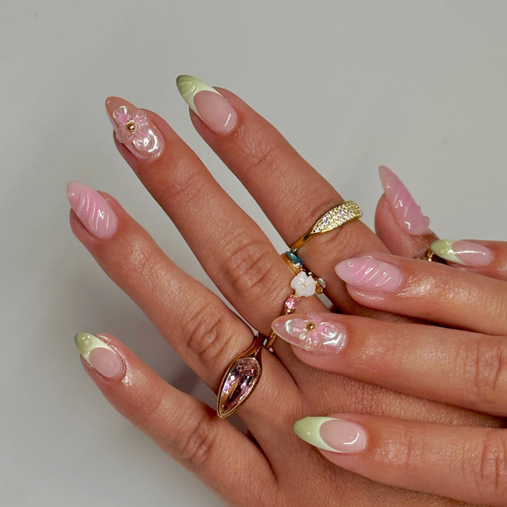 Artful Nail Extensions with Floral Design and Glamorous Accents Stornfield