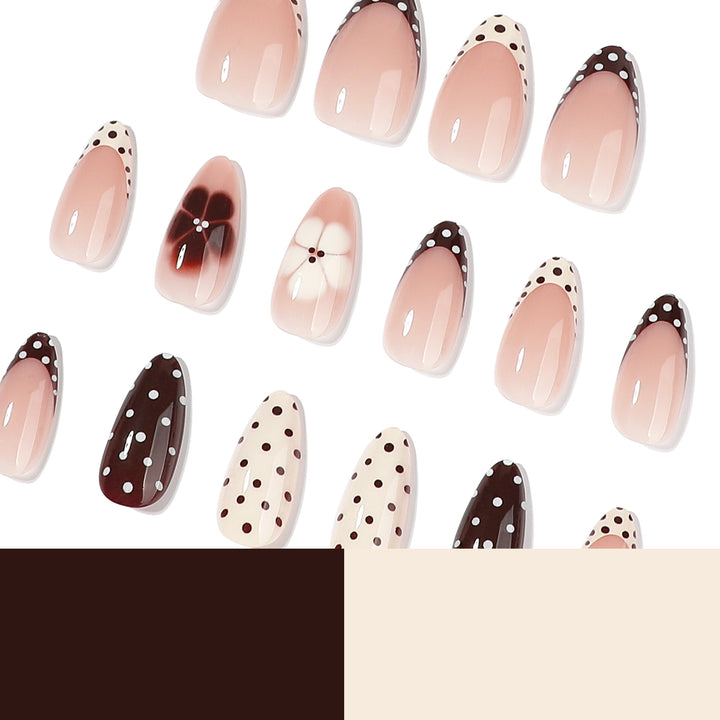 Artful nail art with floral design and various patterns Stornfield