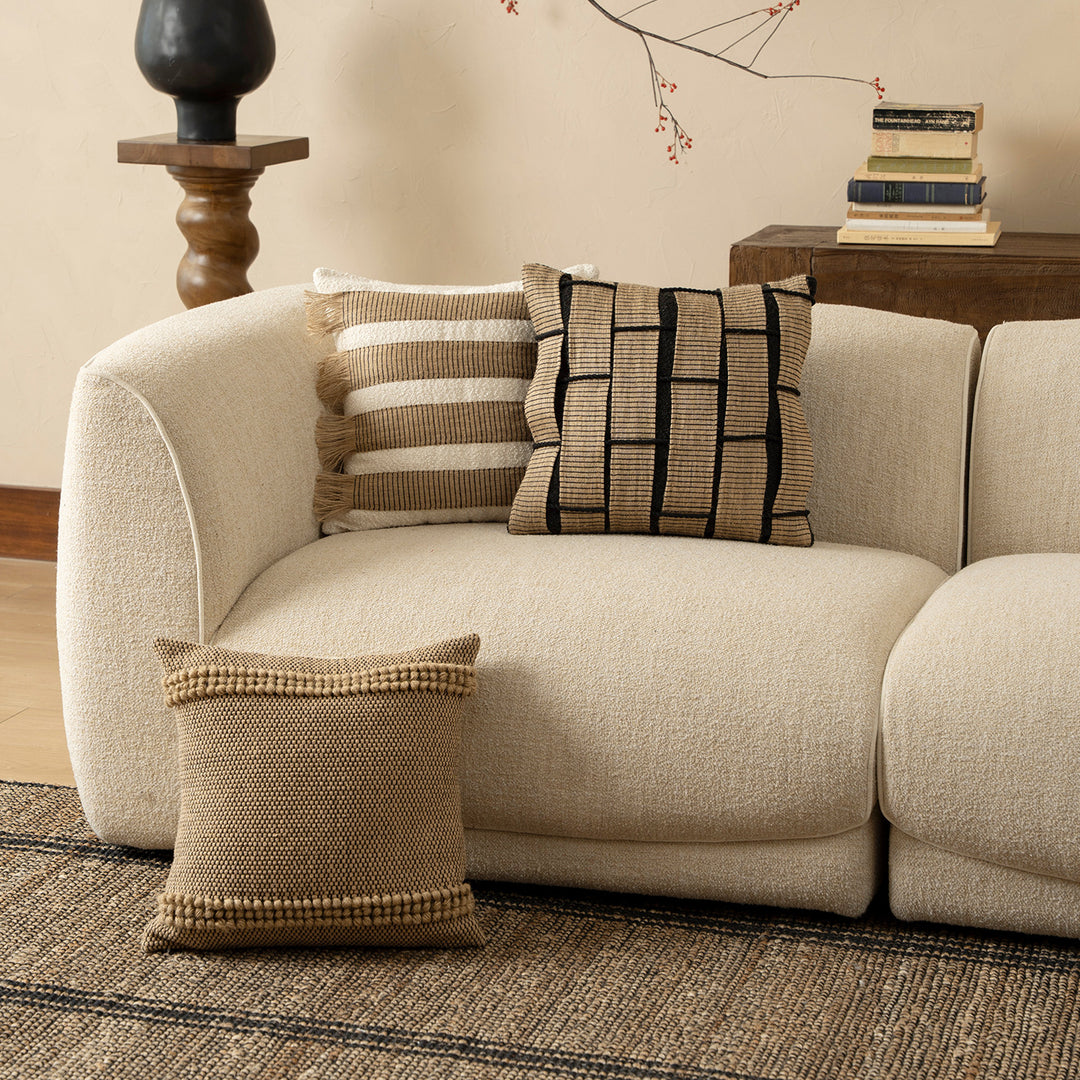 Decorative cushion cover made of woven cotton blend with structured checkered look