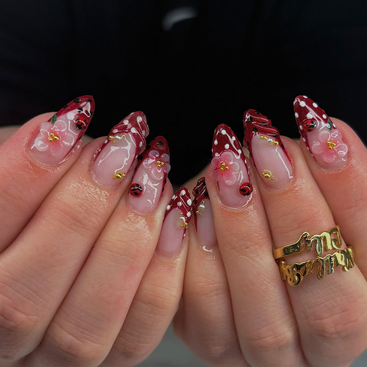 Artistic Floral Press-On Nail Art Set with Ladybug Design Stornfield