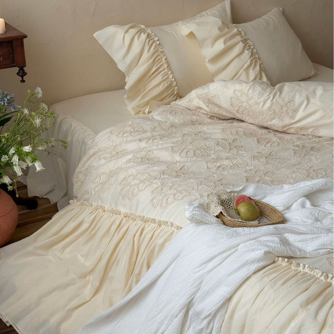Vintage bedding set with ruffled bed skirt and embroidered bedspread