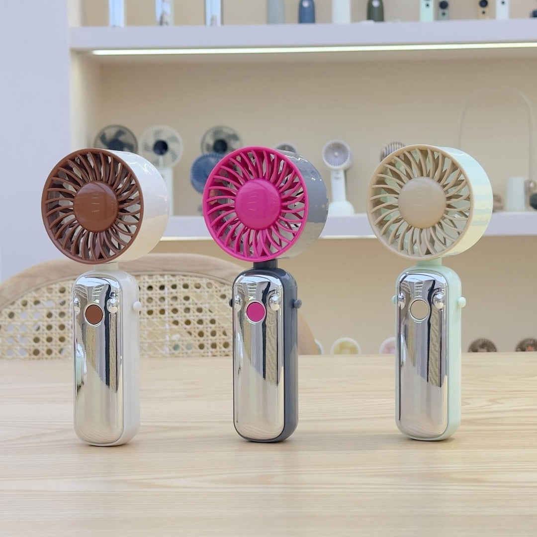 Unisex Portable Handheld Fan with Powerful Battery and Compact Design Stornfield