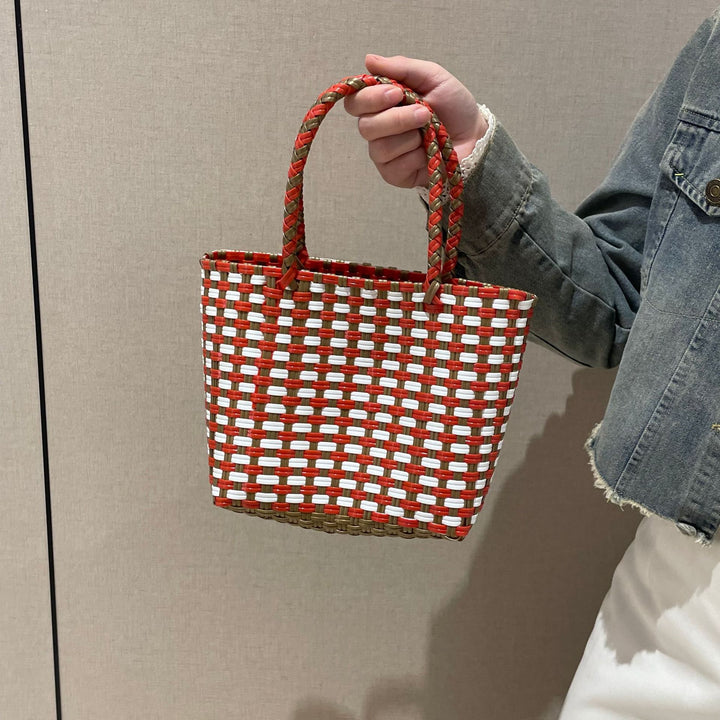 Handwoven basket bag with colorful design Stornfield