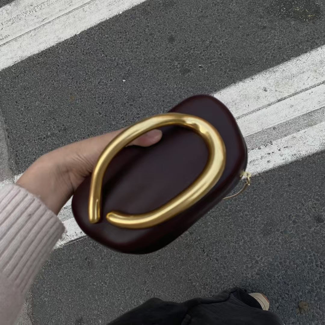 Statement Clutch with Sculptural Handle Stornfield