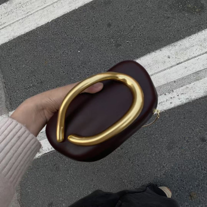 Statement Clutch with Sculptural Handle Stornfield