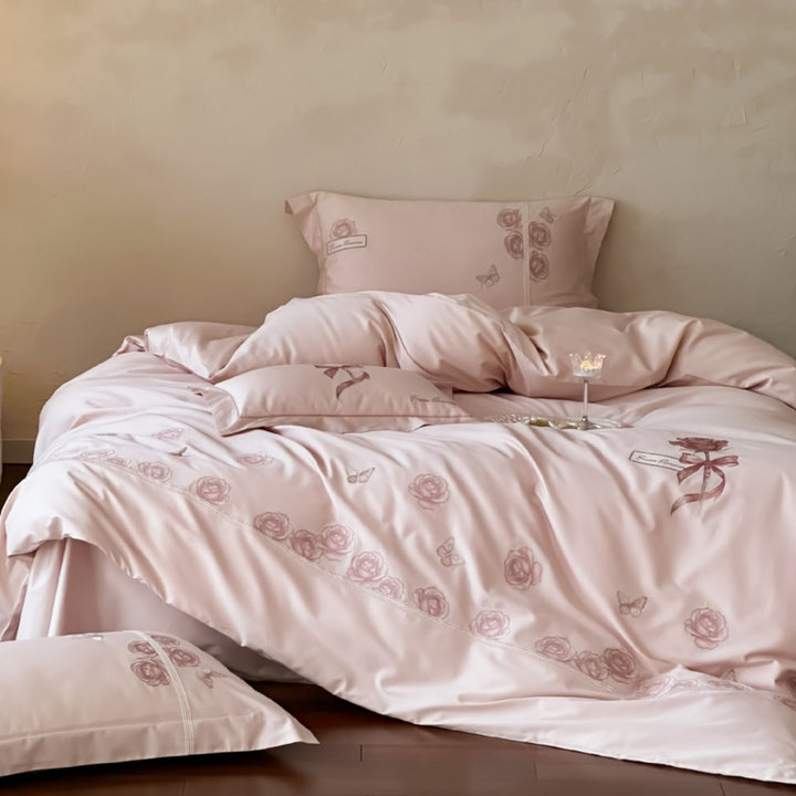 Luxurious cotton satin bed linen set with rose embroidery and butterfly details