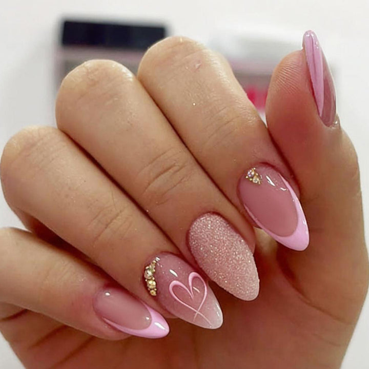 Artificial nail set with delicate glitter and heart designs Stornfield