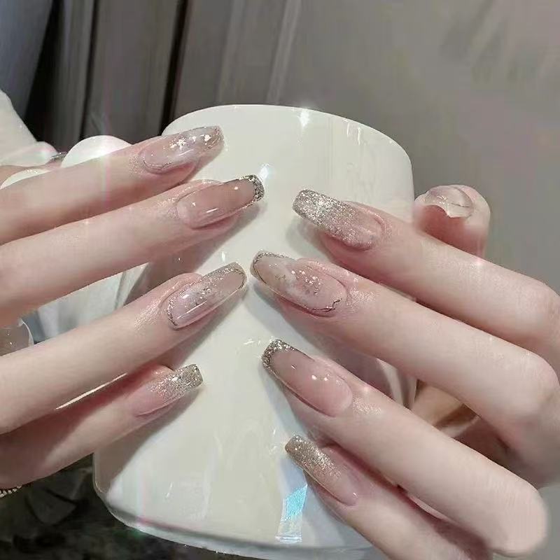 Glamorous artificial nails with rhinestone details Stornfield