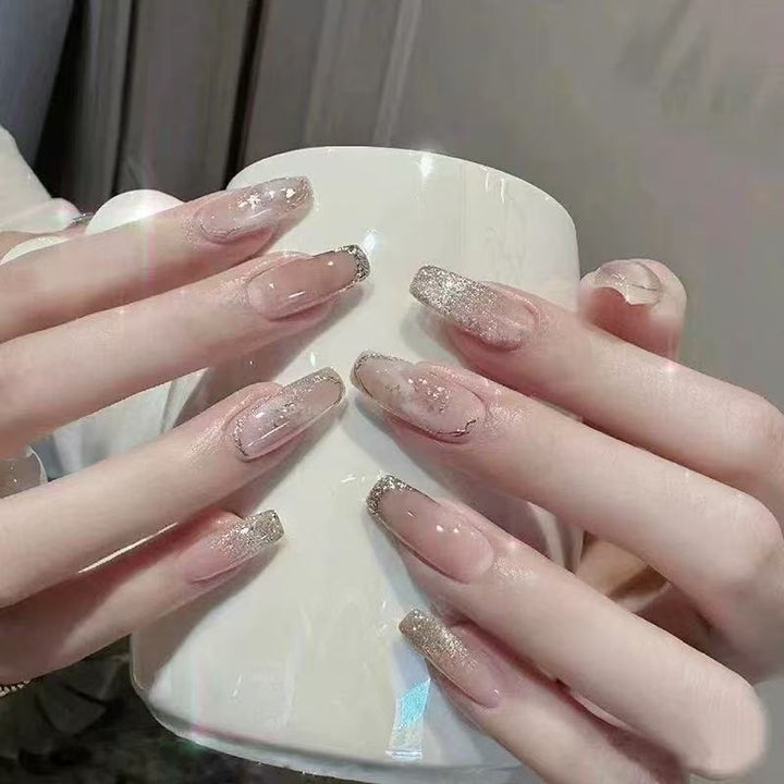 Glamorous artificial nails with rhinestone details Stornfield
