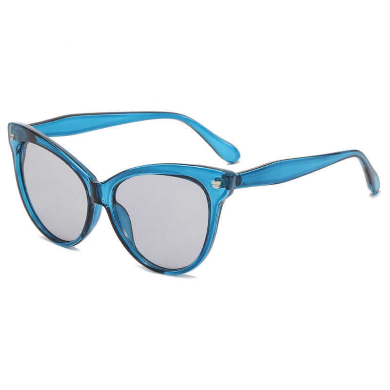 Ladies trendy cat-eye sunglasses with transparent frame and blue lenses Stornfield