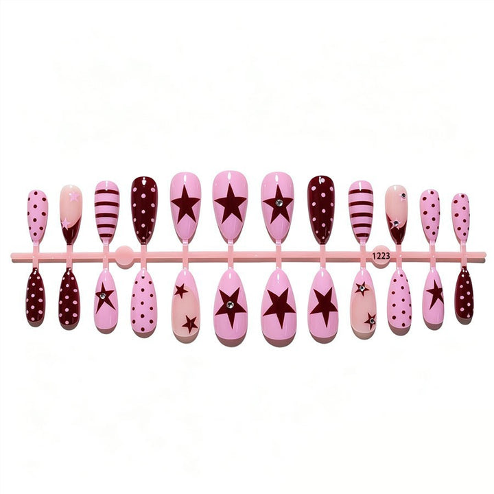 Artificial nail set with asymmetric designs and glitter accents Stornfield