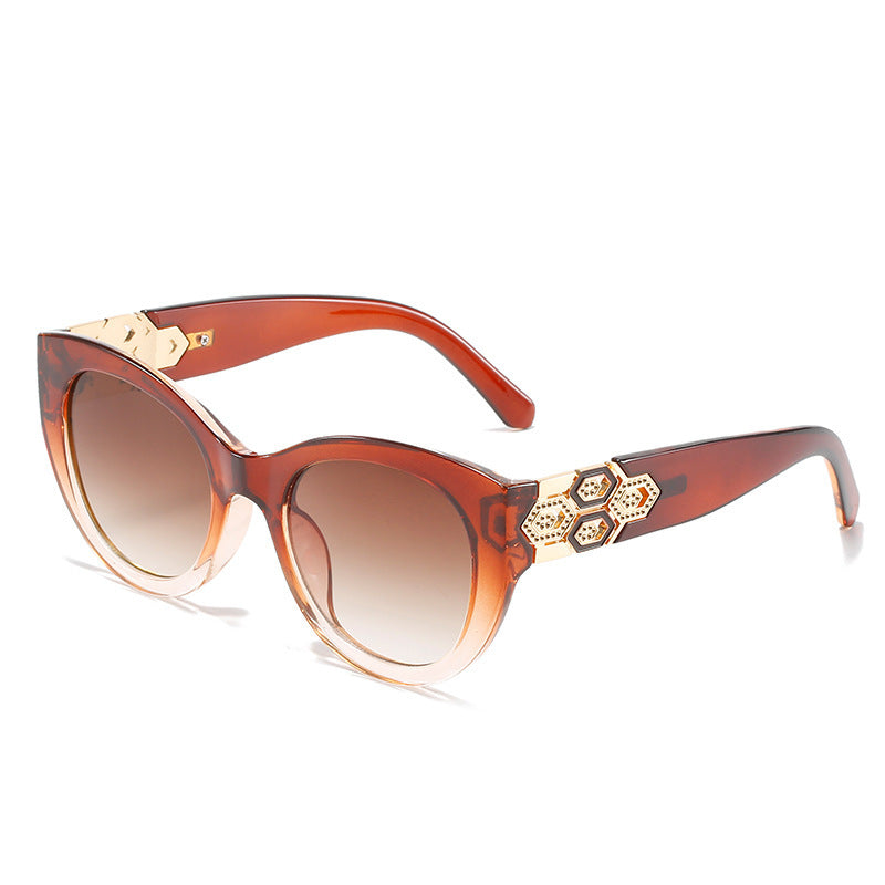 Fashion-Forward Cat-Eye Sunglasses with Decorative Accents Stornfield